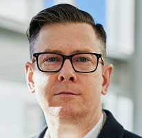 Alexander Hughes – Portret CEO firmy zajmującej się handlem kryptowalutami